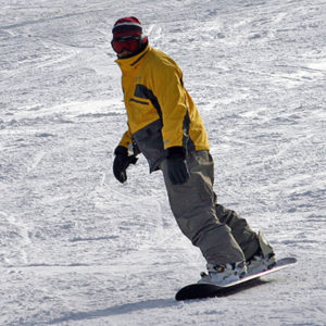 Photograph of Sebastian Aravena snowboarding in Beach Mountain, North Carolina. Photograph by Colleen Aravena.